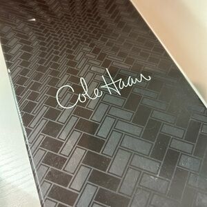 Women’s black leather gloves worn once